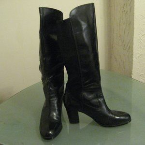 High leather black boot size 11M with heel and stretchy panel  Previouly owned.
